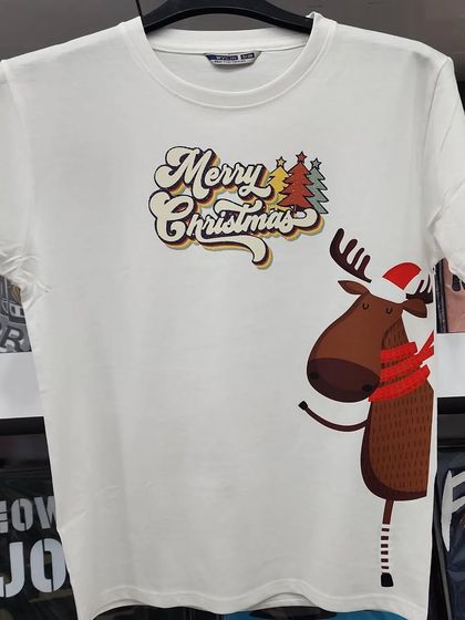 Holiday vibes are in the air. This custom Christmas t-shirt features a cute reindeer with "Merry Christmas" in a retro font, perfect for the festive season.