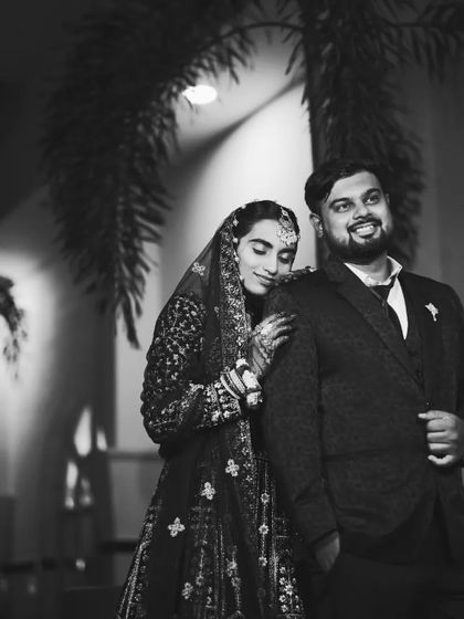 A timeless black and white photo of a reception couple, adding a touch of classic elegance to their wedding album.