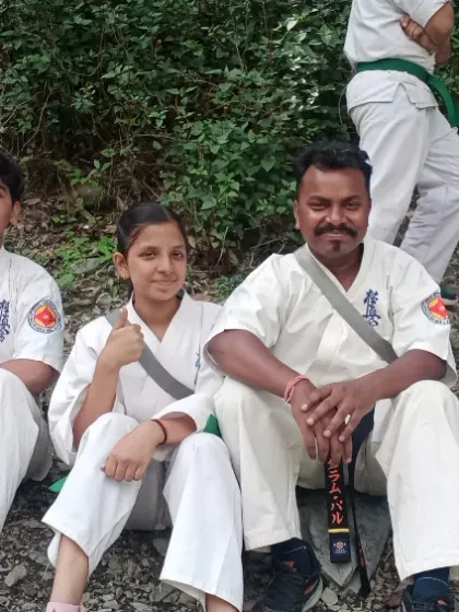 Taking a rest with some of my students during our trek. These informal moments are great for connecting with them on a personal level.