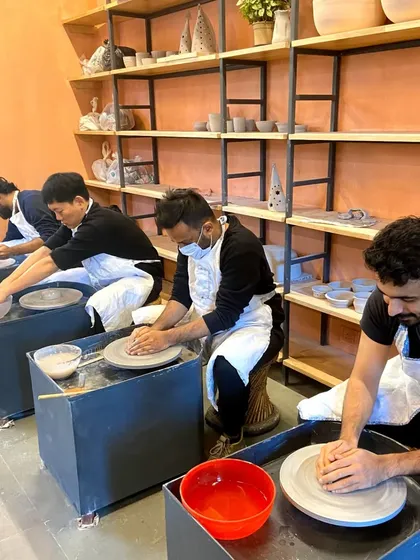 A full house of focused students at the wheels. The energy in our studio during a class is always buzzing with creativity.