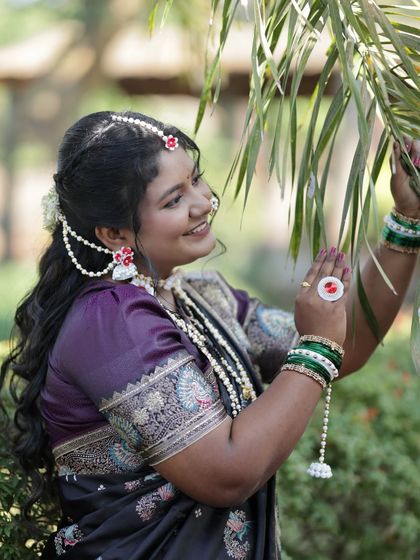 A candid shot that highlights the floral design on the sugar jewellery earrings.
