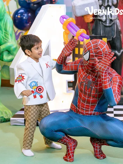 For the little superhero in your life. This custom birthday jacket brings his favorite Avengers characters to life with vibrant, handcrafted patches and his initial embroidered on the lapel. It’s his personality, tailored into an outfit.