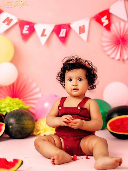 This little girl is 'one in a melon'. I love creating fun, fruit-themed cake smashes that are as sweet as the birthday girl herself.