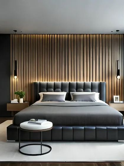 A modern bedroom featuring a slatted wood accent wall with integrated lighting. The room includes a sleek work desk, making it a functional space for both rest and productivity.