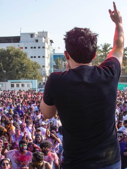 A view from behind me, looking out at the massive, colourful crowd. This is my happy place.