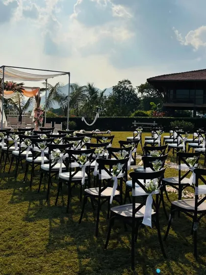 Simple can be stunning. This minimal wedding mandap in Lonavala uses clean lines, flowing drapes, and delicate floral arrangements to create a serene and elegant space that complements the natural beauty of the surroundings.