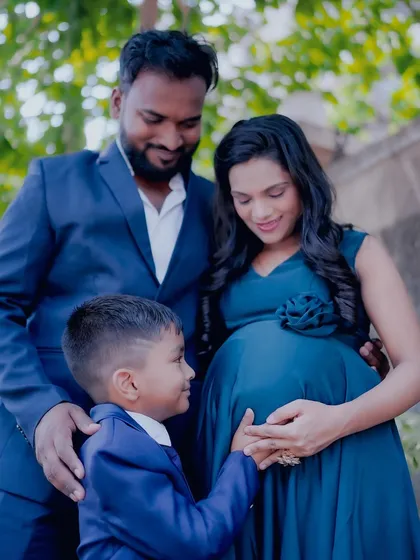 Your whole family is part of this journey. Here, we did an outdoor family maternity session with matching blue outfits for the mom-to-be, dad, and their son. It’s a beautiful way to capture the moment together.