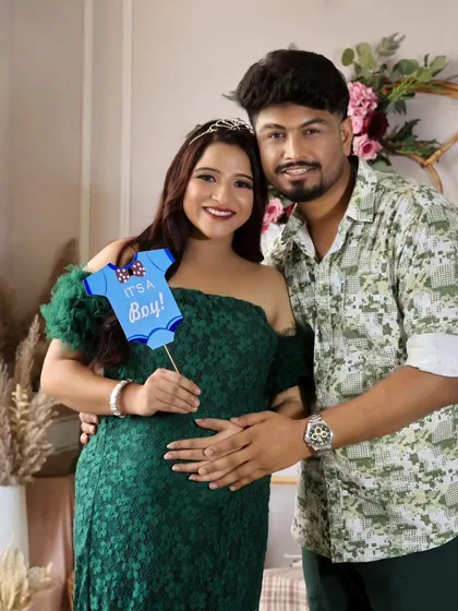 It's a boy! This couple's joy is beautifully captured as they announce the gender of their baby.