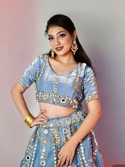 A smiling shot that shows how the makeup looks natural and comfortable. I teach my students to create looks that not only look good but also feel good to wear.