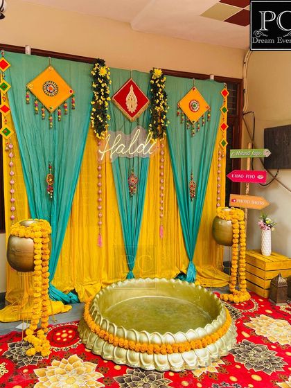 A complete view of the home Haldi setup, showcasing how all the elements come together to transform a simple room into a celebration zone.