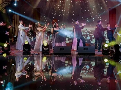 Another angle of the family performance, capturing the joy and energy of the group.