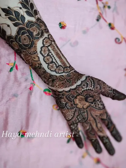 The final look of this intricate cuff and hand design, showing how different elements can be combined to create a stunning and cohesive piece.
