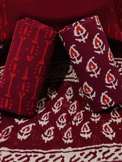 This deep red block print set is a rich and elegant option for your summer ethnic wear.