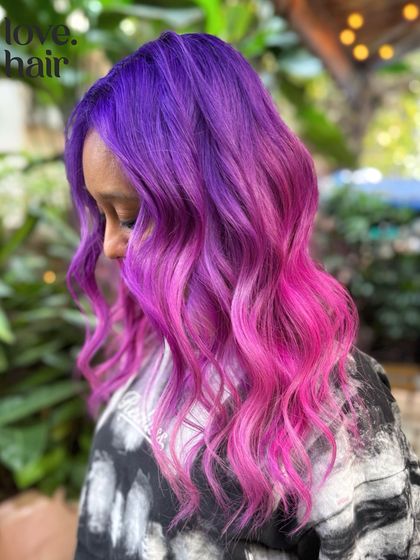 A side profile of the purple and pink ombre melt, showing how the colours frame the face and create a soft, magical effect.