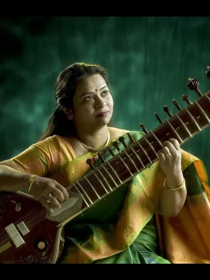 A portrait with my sitar, the instrument through which I express my musical voice. My training is in classical music, but my heart enjoys exploring all forms of melody.