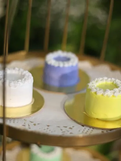 A close-up of our pastel mini cakes. We can customize the colors to match your event's theme perfectly.