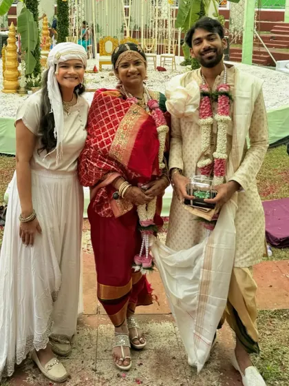 Another photo with the bride and groom, capturing their beautiful traditional wedding attire.