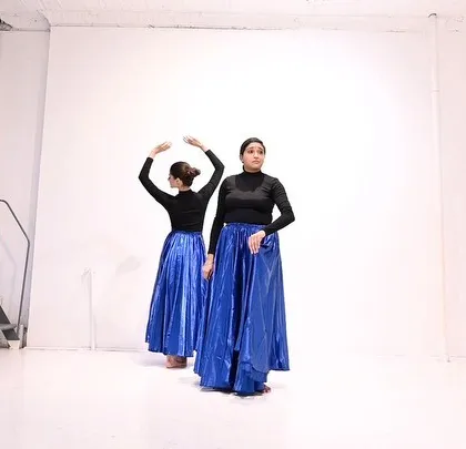A still from a studio performance in New York. This pose captures the feeling of faith and openness that we wanted to convey in the piece.