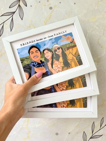 Holding a set of our custom illustration frames. They make such a personal and heartfelt gift for any occasion.