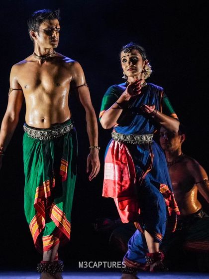 A performance still from 'Nagamandala' with my fellow artists. The chemistry and interaction between performers are central to my group choreography, bringing the characters and their relationships to life.