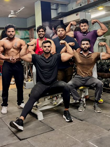 My team. Another group pose showing the camaraderie and shared passion for bodybuilding.