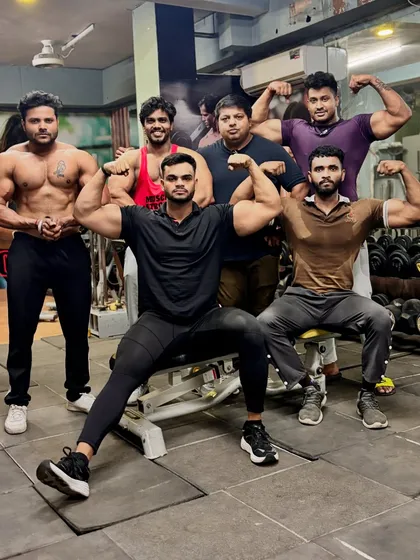 My team. Another group pose showing the camaraderie and shared passion for bodybuilding.