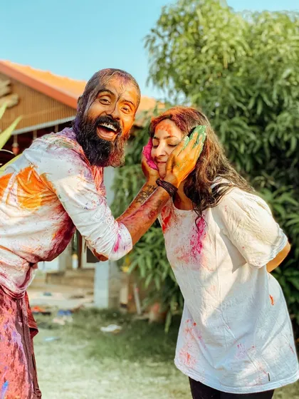 During the festival of Holi, we celebrate with color and joy. Here, I share a playful moment with a student, embodying the spirit of connection and happiness.
