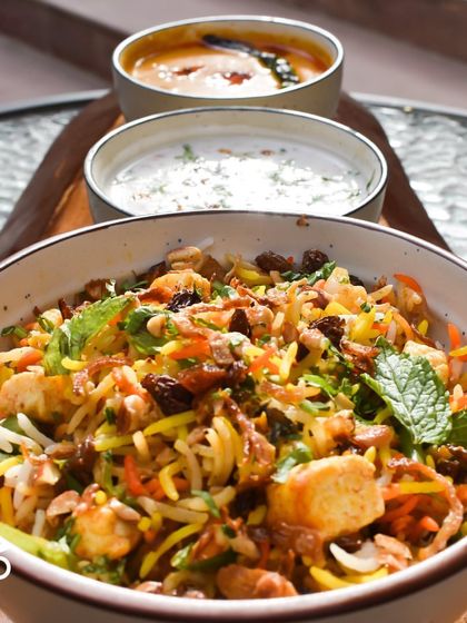 Here's another look at my Nizami Tarkari Pulao, served with raita and salan. It's a complete, filling meal that's packed with warming flavors and textures.