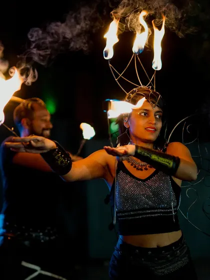 To make your Sangeet or reception truly unforgettable, I can arrange for spectacular entertainment. These fire dancers added a thrilling and dramatic flair to the evening's festivities.