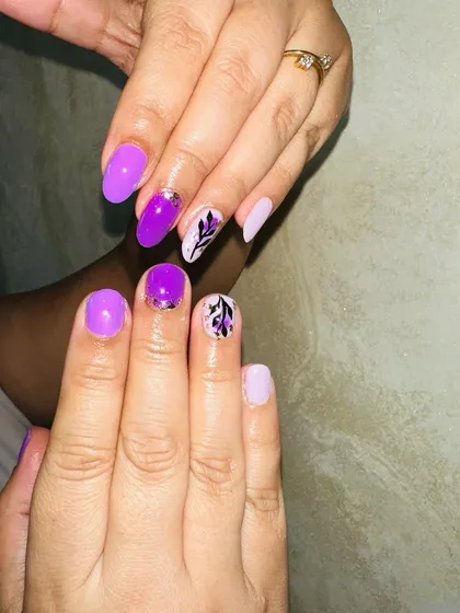 A beautiful lavender set with hand-painted black leaf art and gold foil accents.