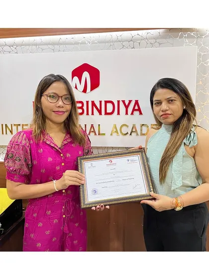 A wonderful moment of achievement. Congratulations to our graduate on receiving her professional certification.