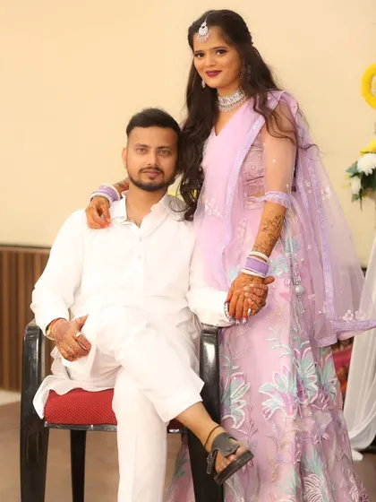 A modern couple's portrait from their sangeet or engagement party.