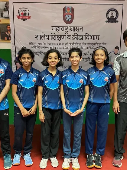 Our champion U-14 girls' team poses with their coaches after winning the gold medal at the Mumbai Divisional DSO Inter-School event.