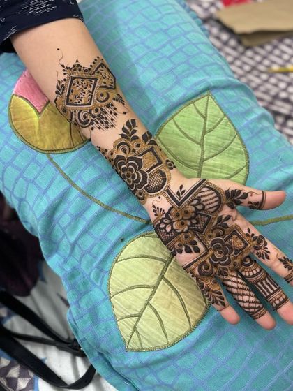 A modern, geometric fusion design. This style uses squares, lines, and bold floral blocks for a contemporary feel.