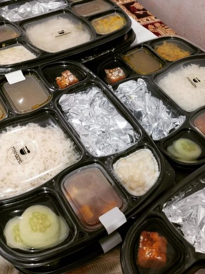 We offer a variety of thali combinations to keep your daily meals interesting. This meal pack features rice, multiple curries, fresh cucumber slices, and a pickle, ensuring a balanced and flavorful experience every time.