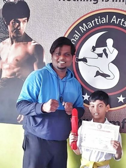 National Martial Arts and Fitness Academy - Kids Martial Arts & Fitness The Journey of Discipline: Belt Graduations photo 38