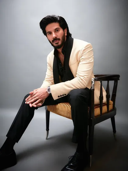 Styling Dulquer Salmaan for the GQ Most Influential Young Indians feature. This classic tuxedo look with a cream jacket and black lapel by Masculine Official is timeless and sophisticated.