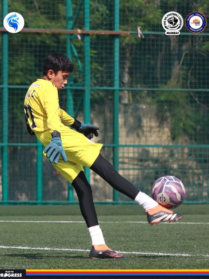 A goalkeeper practices his distribution. In modern football, the keeper is the first attacker, a concept we teach our players.