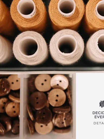 "Decide every detail." From a vast collection of threads to unique, handcrafted buttons, I offer my clients the ability to customize every single element of their outfit.