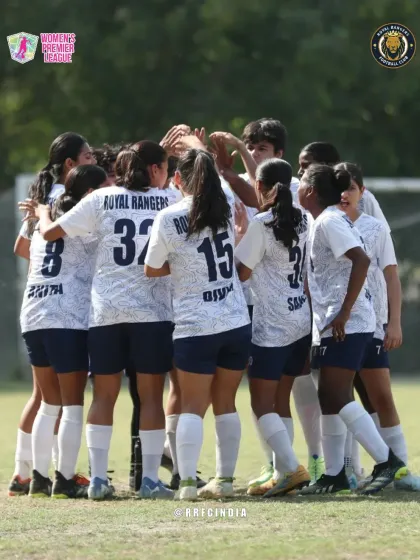 Together, we are stronger. This is our team in a pre-game huddle, a moment of unity and focus before heading into battle in the Women's Premier League.