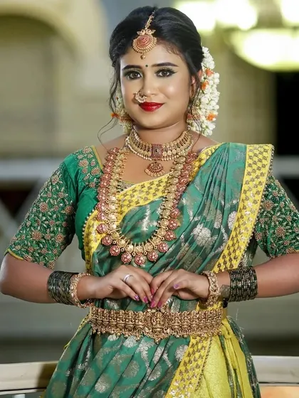 A beautiful half-saree look elevated with our traditional temple jewellery, showing how these pieces can be styled for various functions.