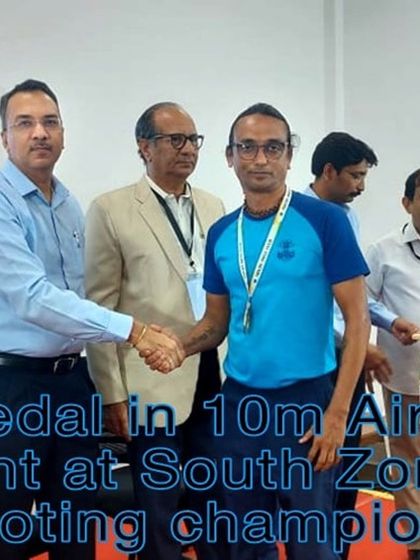 Our shooter Thilak receiving his gold medal for the 10m Air Rifle Master Men event at the South Zone Shooting Championship.