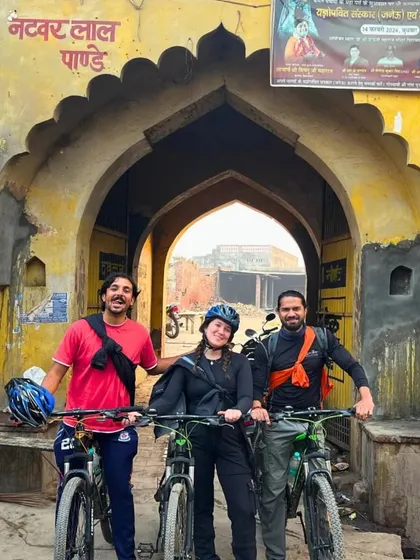 Posing at a historic gateway in the Braj region during our Delhi-Agra cycle tour. Every stop is a photo opportunity and a chance to soak in the timeless atmosphere of rural India.