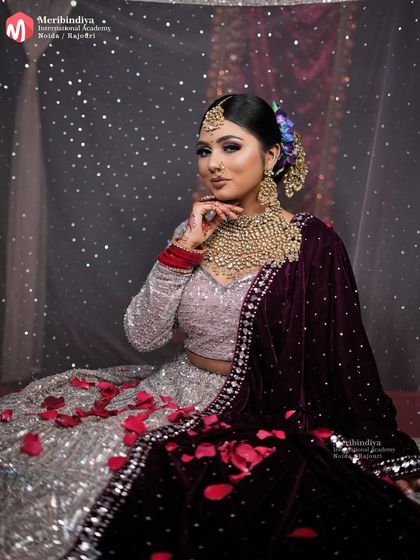 My goal is to empower brides with confidence. This pose captures the essence of a bride who feels beautiful and powerful, a result of expert makeup artistry.