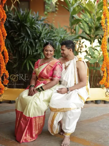 The Unjal ceremony is a beautiful and playful South Indian ritual. We ensure the setup is perfect for these cherished moments, with traditional swings decorated with fresh marigold garlands.