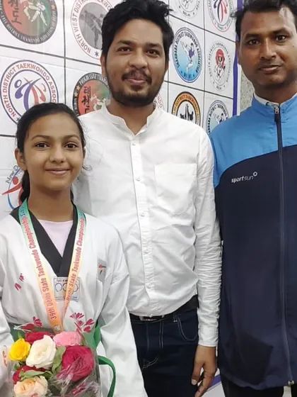 Celebrating with my students Sarisha Jha and Zoie after they both won bronze medals in Poomsae at the Delhi State Taekwondo Championship.