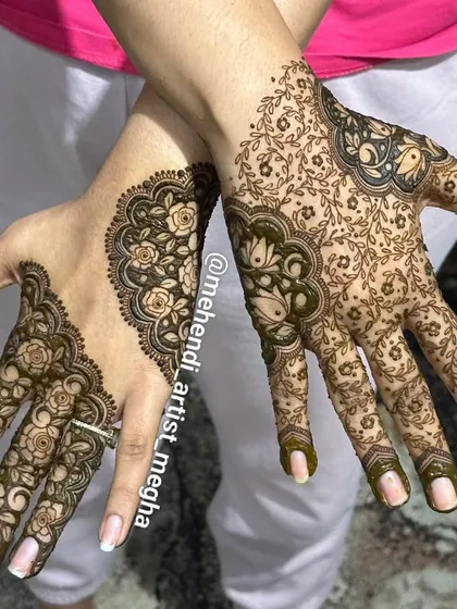 For those who love a lighter touch, this asymmetrical design features delicate rose vines that gracefully flow across the hands, creating a modern and romantic feel.