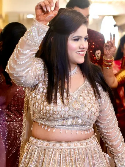 Dancing with joy! The makeup is designed to last through a whole night of celebration.