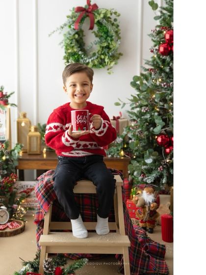 A warm mug of hot chocolate is a Christmas essential. This portrait captures a simple, happy moment from one of my holiday mini sessions.