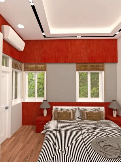 A bedroom concept with a bold red accent wall and striped bedding.